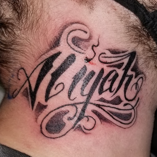 Explore car guy tattoos ideas, creative tattoo ideas in Angola, available at Hoodlum Ink