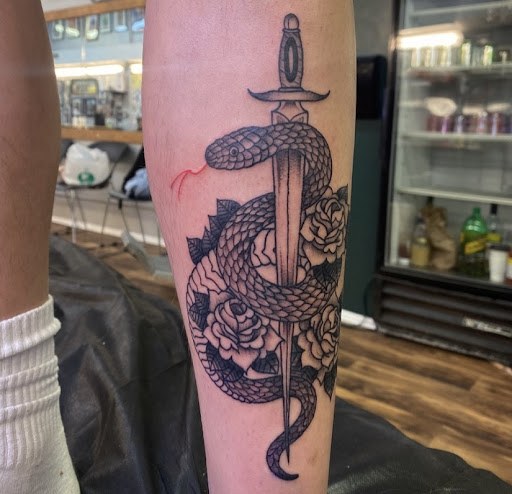 Explore chest tattoo ideas male, creative tattoo ideas in Baltimore, available at Rippd Canvas Tattoo Shop Artists Social Club