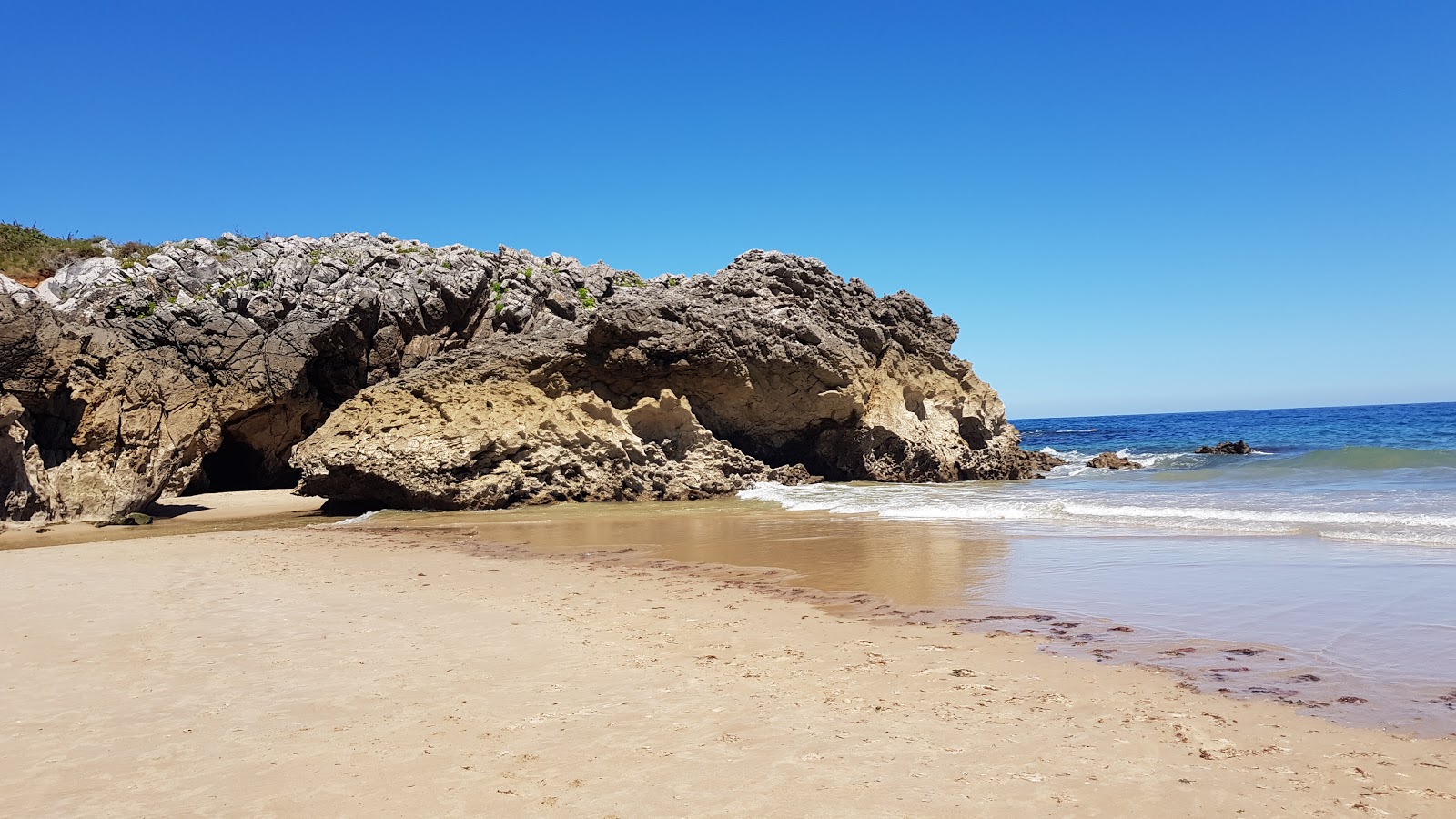 Foto di Playa de la Huelga con baia piccola