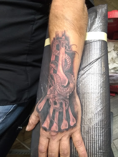 Find cat tattoos ideas for your next unique tattoo in Hoschton at The Golden Mantis Tattoo & Piercing