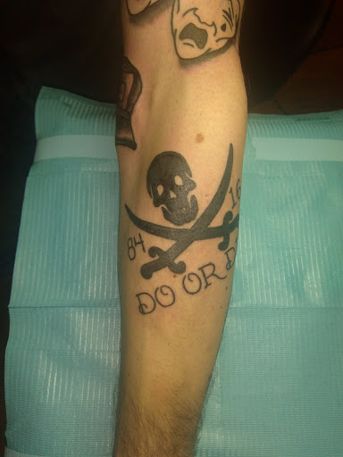 Explore shoulder cap tattoo ideas, creative tattoo ideas in Albany, available at Dead Presidents Lounge