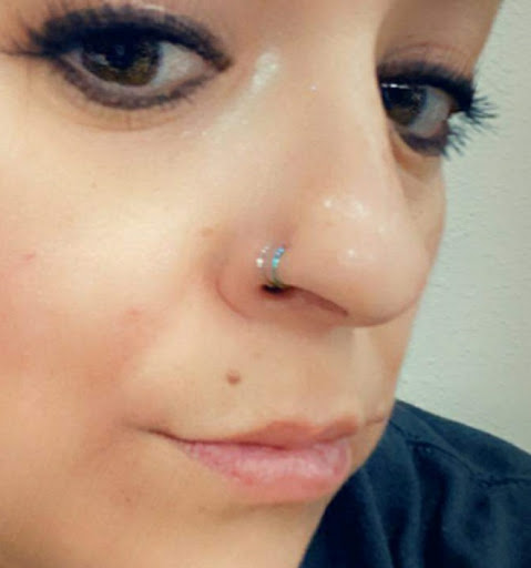 Explore cross tattoo ideas for guys, creative tattoo ideas in Laramie, available at Deviant Piercings and Tattoo