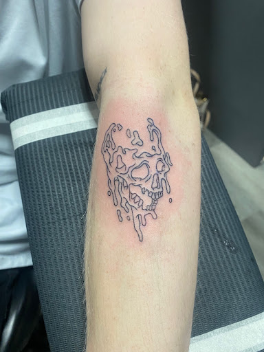 Explore small frog tattoo ideas, creative tattoo ideas in Peoria, available at Modern Ink Tattoo