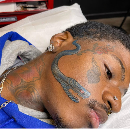 Explore name neck tattoo ideas, creative tattoo ideas in Orange Park, available at Big City Tattoo and Piercing