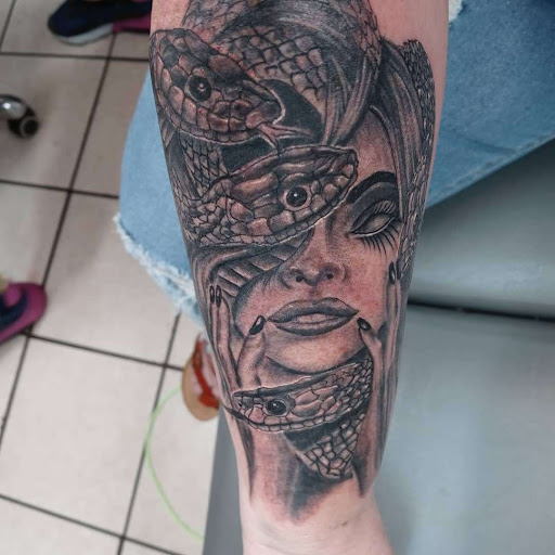 Explore nicki minaj tattoo ideas, creative tattoo ideas in Jefferson, available at R3 Tattoo