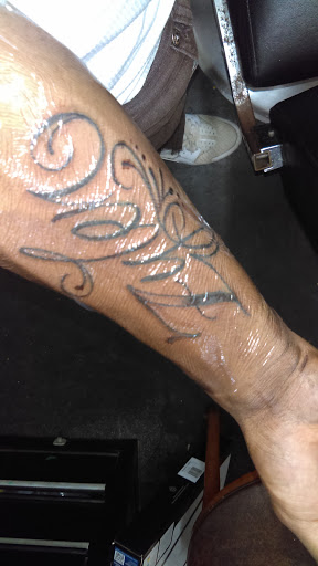 Explore 3 kids tattoo ideas for mom, creative tattoo ideas in Morrow, available at The Inkers Parlour