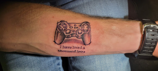 Explore face tattoo ideas for females, creative tattoo ideas in Angola, available at Hoodlum Ink