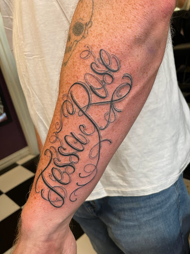 Explore mens tree tattoo ideas, creative tattoo ideas in Georgetown, available at Iron Rite Tattoo South