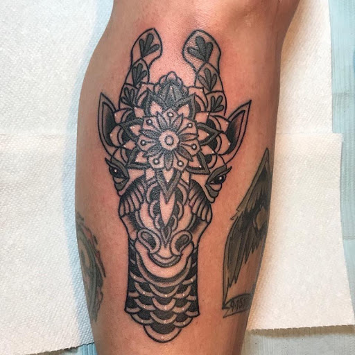 Explore tattoo for men idea, creative tattoo ideas in Groton, available at Black Dragon Tattoo Company