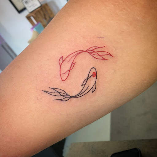 Explore wedding finger tattoo ideas, creative tattoo ideas in Greensboro, available at Dogwood Ink