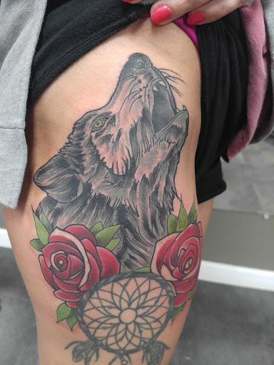 Explore hunger games tattoo ideas, creative tattoo ideas in Gadsden, available at Sacred Art Tattoo Company