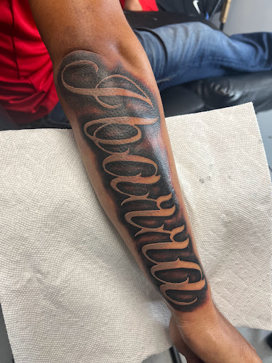 Explore dad and son tattoo ideas, creative tattoo ideas in Mcallen, available at House of Tattoos