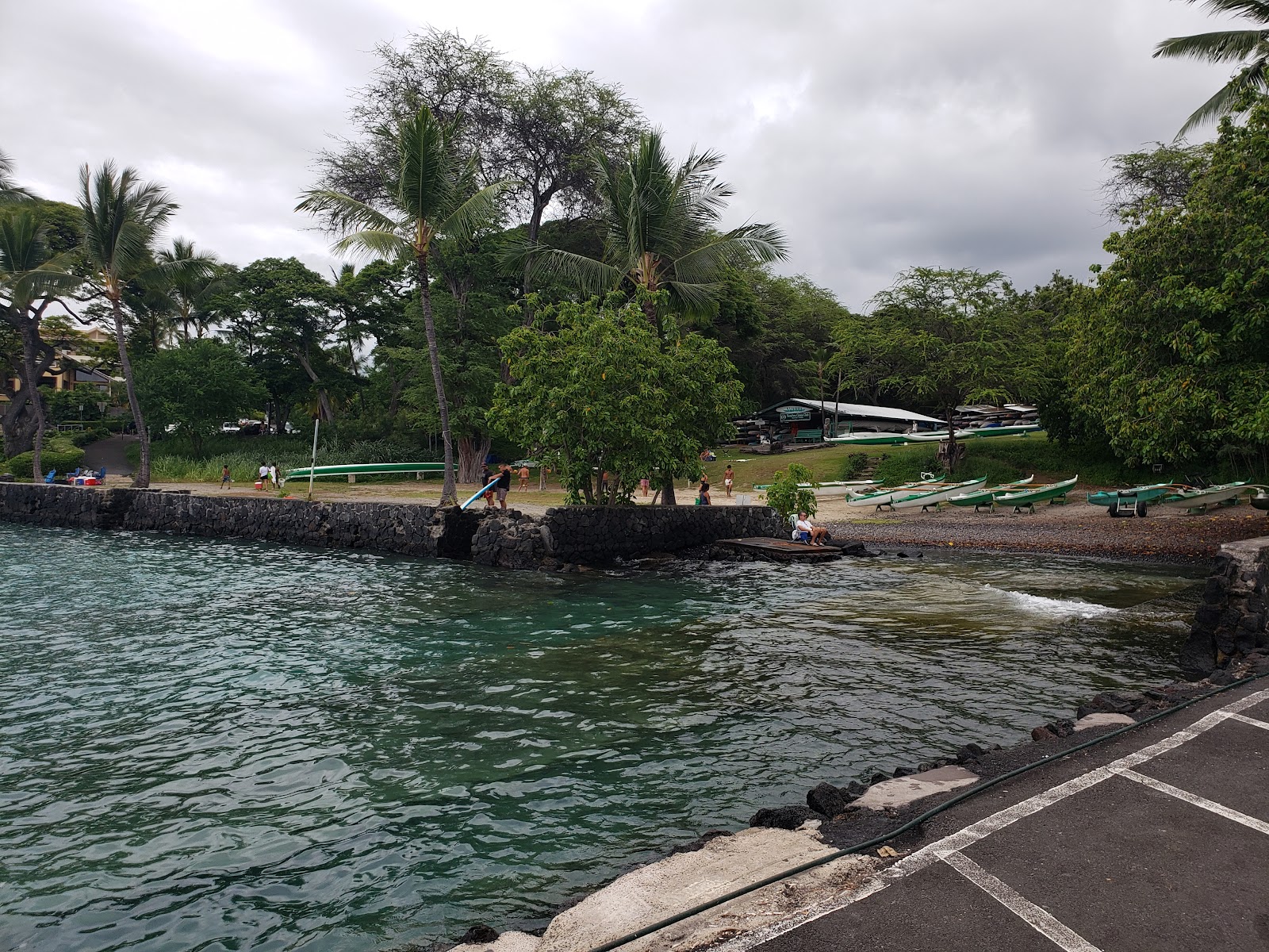 Photo of Keauhou Bay Beach with turquoise pure water surface