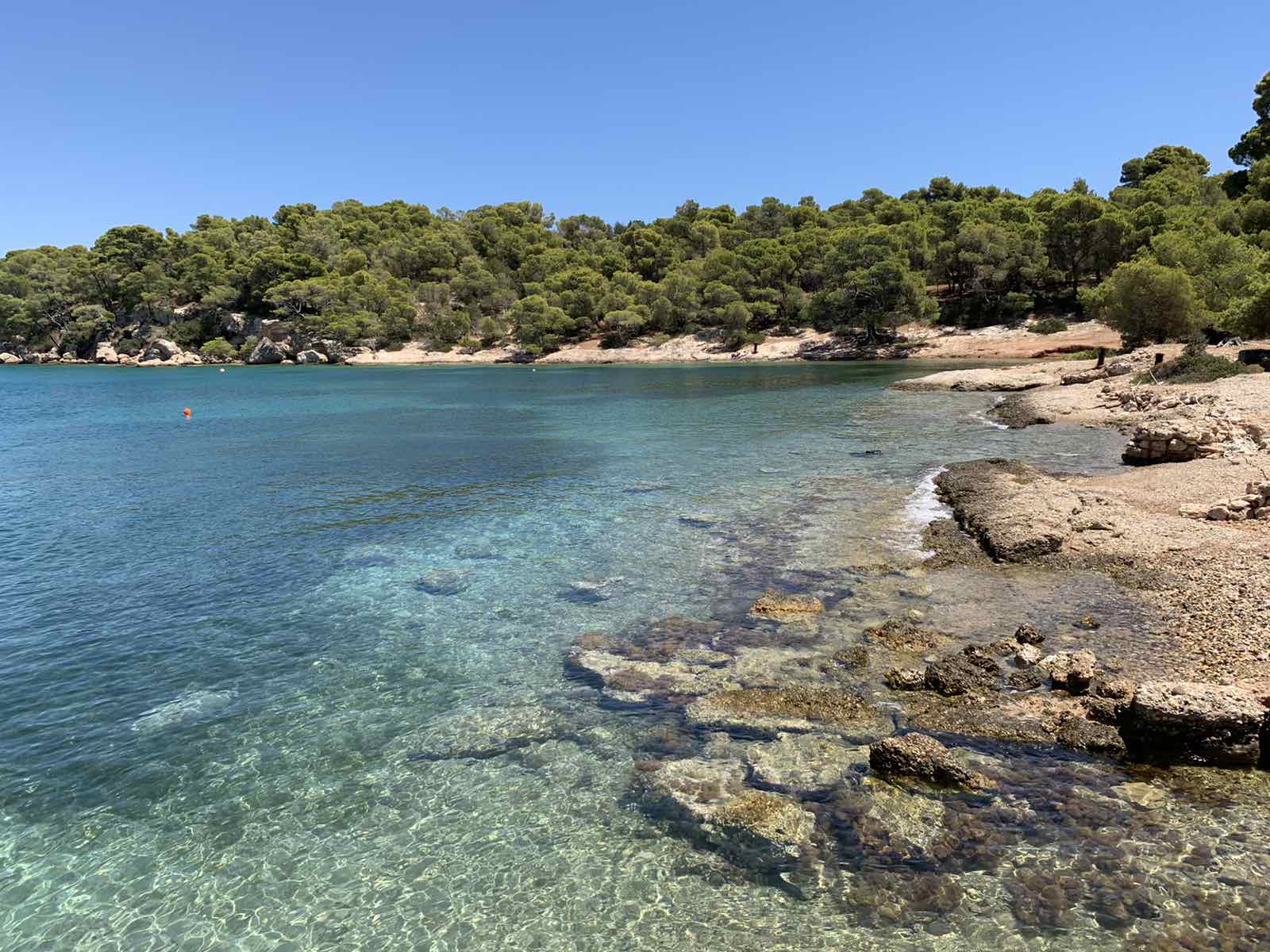 Foto von Paralia Zogerias II mit beiger sand & steine Oberfläche