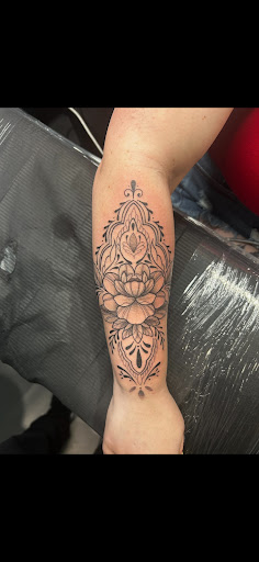 Explore skier tattoo ideas, creative tattoo ideas in Weatherford, available at Weatherford Tattoo Co.