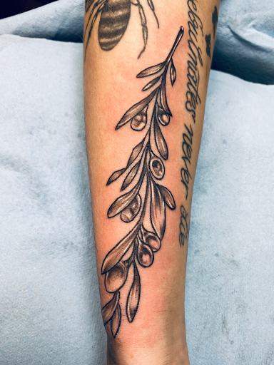 Explore joker card tattoo ideas, creative tattoo ideas in Warner Robins, available at Untold Pain Tattoo Studio