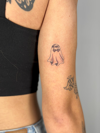 Explore sternum tattoo ideas for females, creative tattoo ideas in Saint Petersburg, available at Lucky You Tattoo