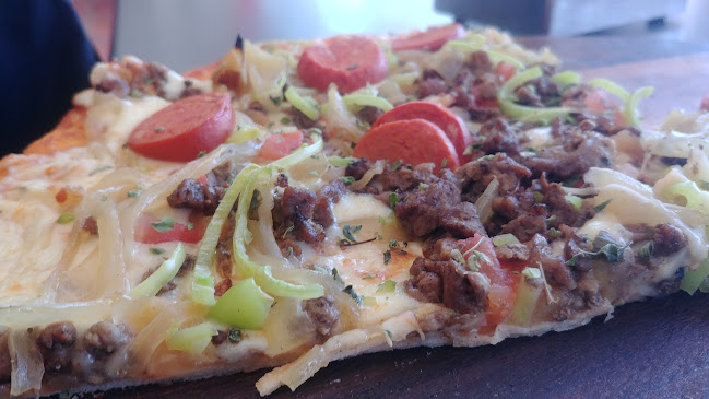 Opiniones de Pizzas y Tacos para servir y llevar en Calama - Restaurante