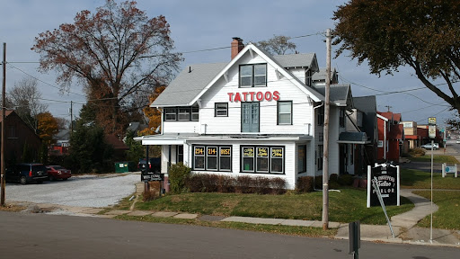 Explore snoopy tattoo ideas, creative tattoo ideas in Canton, available at The Inkeepers Tattoo Parlor