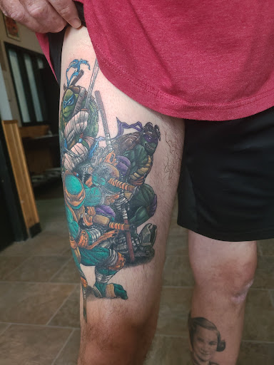 Explore half sleeve tattoo ideas black and grey, creative tattoo ideas in Omaha, available at LeVeL UP Tattoo