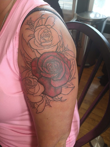 Explore nephew tattoo ideas, creative tattoo ideas in Canton, available at The Inkeepers Tattoo Parlor