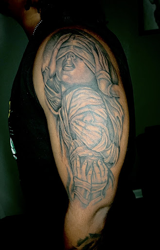 Explore violin tattoo ideas, creative tattoo ideas in Chattanooga, available at Chattanooga Tattoo Company