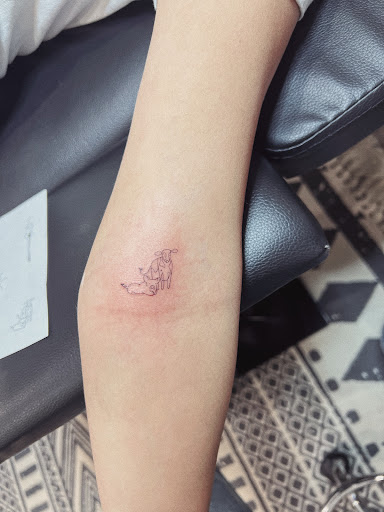 Explore fishing tattoo ideas for men, creative tattoo ideas in Burley, available at Fine Line Ink