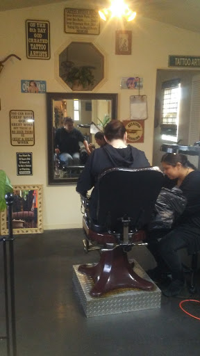 Explore strength tattoo ideas, creative tattoo ideas in Farina, available at Suicide Kings Tattoo & Piercing
