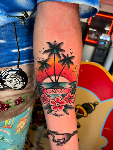 Explore dragon tattoo ideas for guys, creative tattoo ideas in Honolulu, available at Sacred Art Tattoo Waikiki