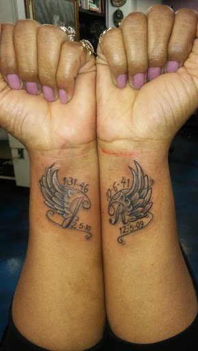 Tattoo Shop «Liquid Tattoo», reviews and photos, 16583 Old U.S. 27, Lansing, MI 48906, USA