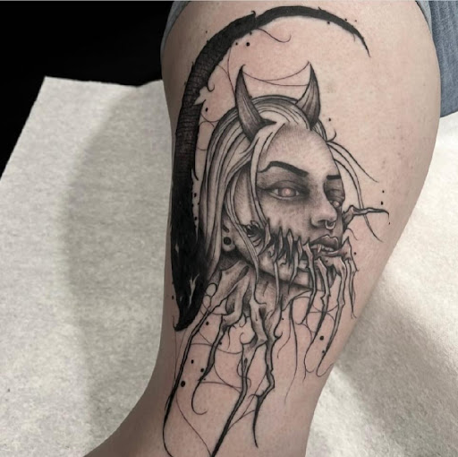 Explore cross with names tattoo ideas, creative tattoo ideas in Spokane, available at Feel Good Ink