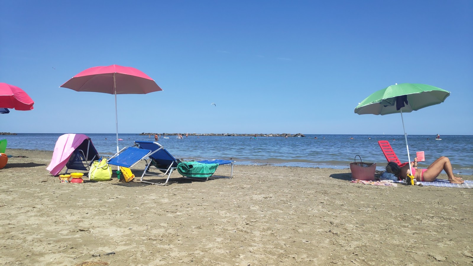 Foto van Spiaggia di Porto Garibaldi met turquoise puur water oppervlakte
