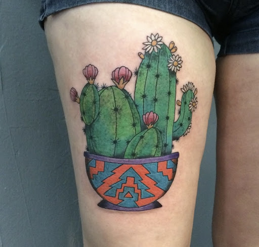 Explore tattoo ideas for top of leg, creative tattoo ideas in Phoenix, available at Crawling Squid Tattoo Studio