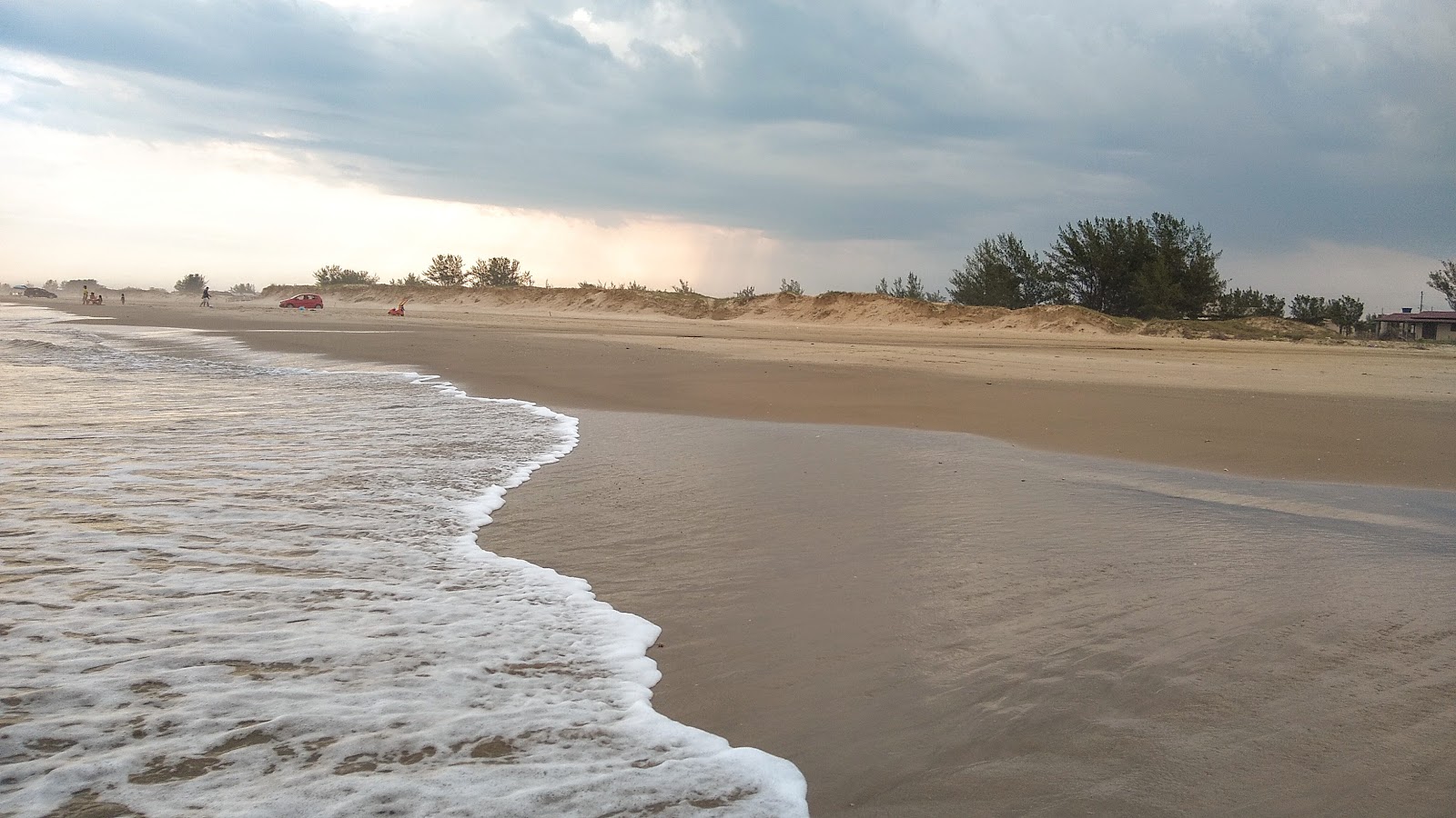 Foto de Praia Fernao Capelo con recta y larga