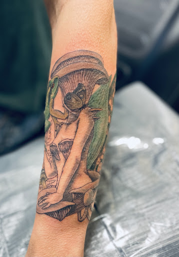 Explore sleeping beauty tattoo ideas, creative tattoo ideas in Walnut Cove, available at Wildfire Tattoo Studio