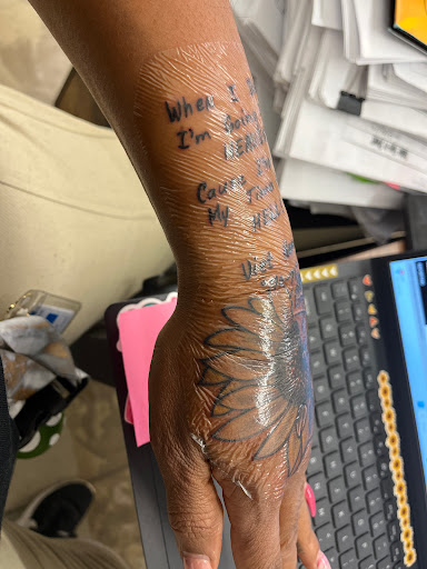 Explore religious elbow tattoo ideas, creative tattoo ideas in Detroit, available at Motown Tattoo Company