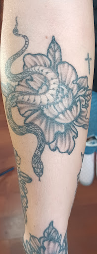 Explore weightlifting tattoo ideas, creative tattoo ideas in Shippensburg, available at LAZY WIZARD TATTOOS