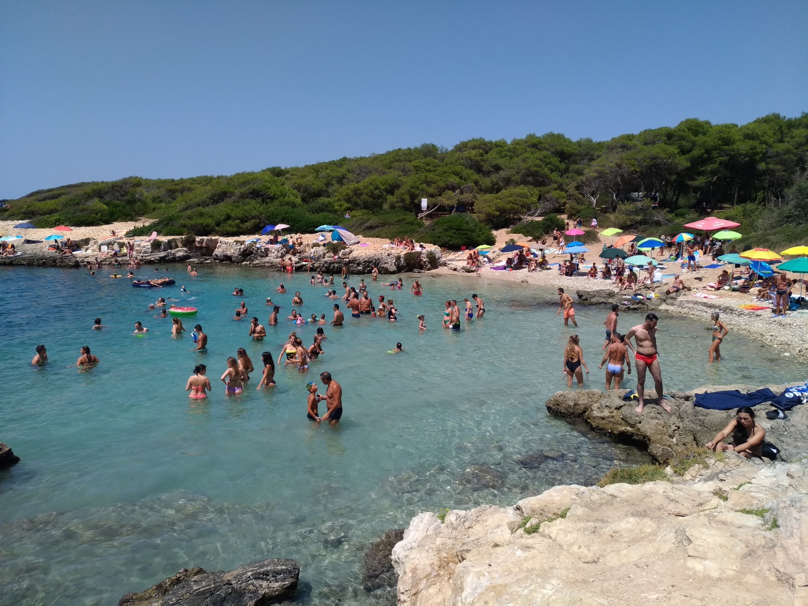 Foto von Spiaggia di Porto Selvaggio mit kleine bucht
