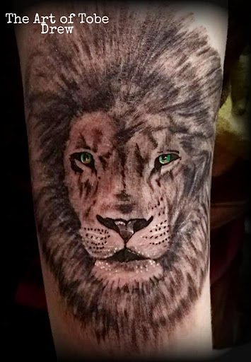 Explore frame tattoo ideas, creative tattoo ideas in Defiance, available at Handcrafted Body Art