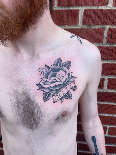 Explore dark romance tattoo ideas, creative tattoo ideas in Strasburg, available at Champion Tattoo Company