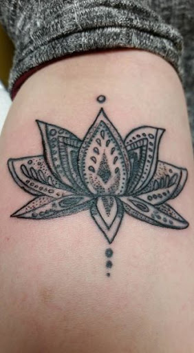 Explore neck word tattoo ideas, creative tattoo ideas in Cumberland, available at Queen City Ink