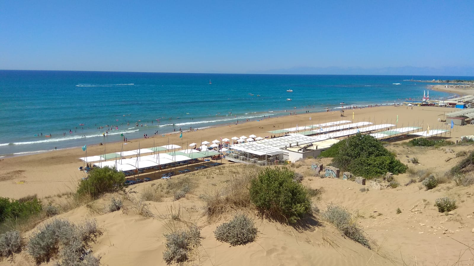 Photo of Terrace Resort beach with brown sand surface