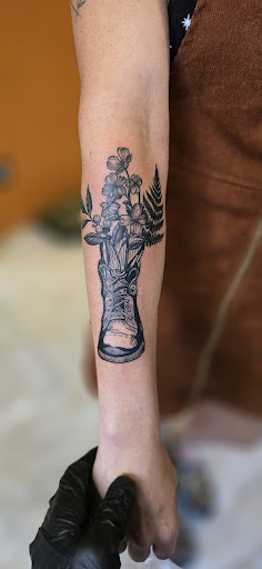 Explore astronomical tattoo ideas, creative tattoo ideas in New Castle, available at 311 Tattoo