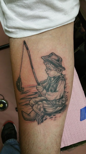 Find top shoulder tattoo ideas for your next unique tattoo in Storm Lake at Alley Cat Tattoo