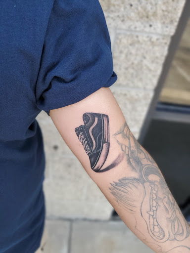 Explore back of ear tattoo ideas, creative tattoo ideas in Whittier, available at Whittier Tattoo