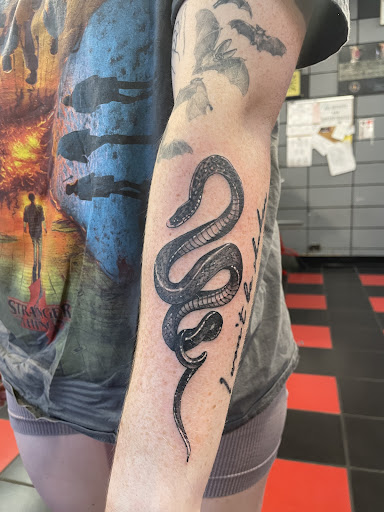 Explore peaceful tattoo ideas, creative tattoo ideas in Lakeland, available at Atomic Tattoos Lakeland