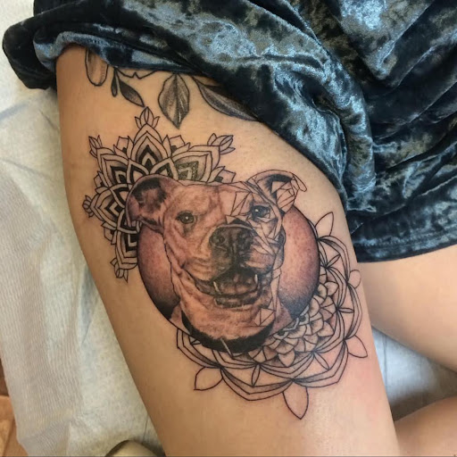 Find tattoo ideas for woman on leg for your next unique tattoo in Fresno at American High Voltage Tattoo
