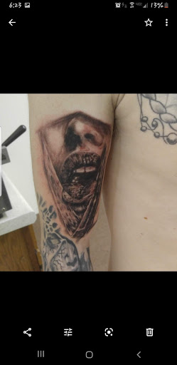 Explore baby foot print tattoo ideas, creative tattoo ideas in Hudson Falls, available at ALTERED ADDICTION TATTOOS