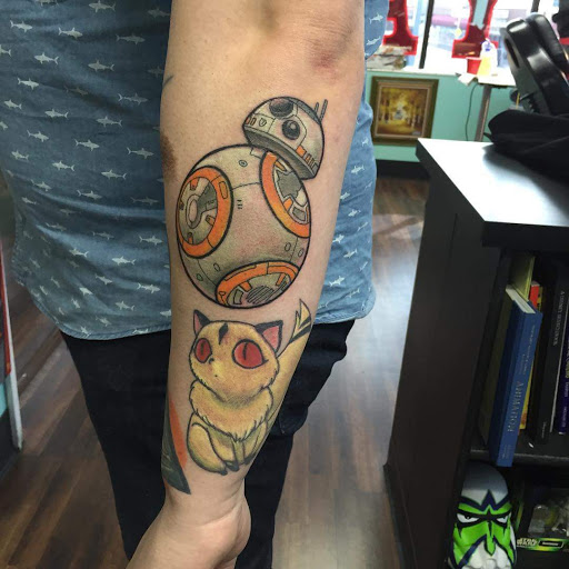 Explore tattoo ideas for female thigh, creative tattoo ideas in Reno, available at Evolution Tattoo