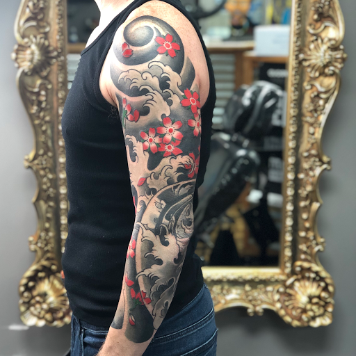 Explore free hand tattoo ideas, creative tattoo ideas in Huntington, available at Golden Dagger Tattoos and Piercings